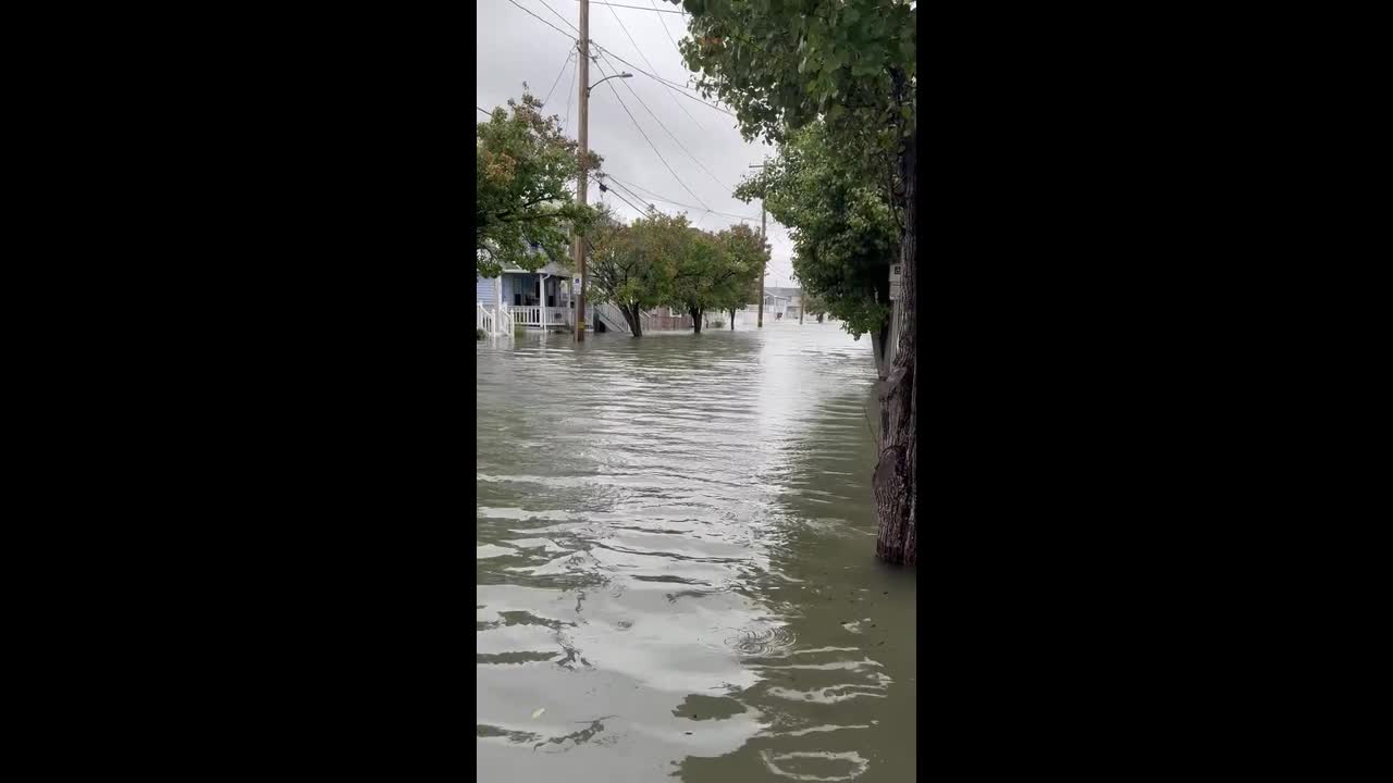 Floodwaters submerge homes and streets on Juniper Avenue in Wildwood, USA