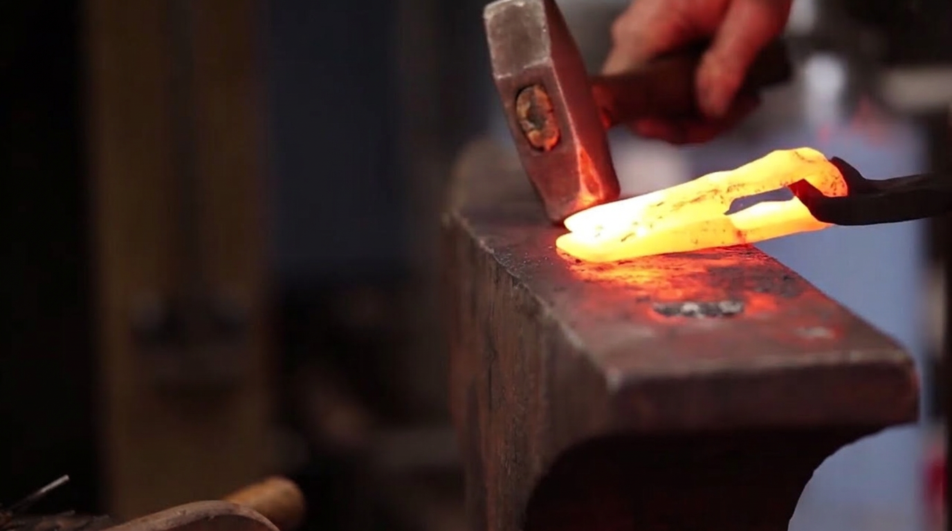 Forging a wrapped eye axe by hand