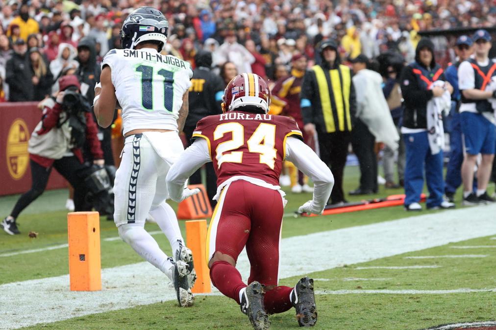 Sep 27, 2026; Landover, Maryland, USA; Seattle Seahawks wide receiver Jaxon Smith-Njigba (11) makes a touchdown catch over Washington Commanders cornerback Fabian Moreau (24) at Northwest Stadium. Mandatory Credit: Geoff Burke-Imagn Images
