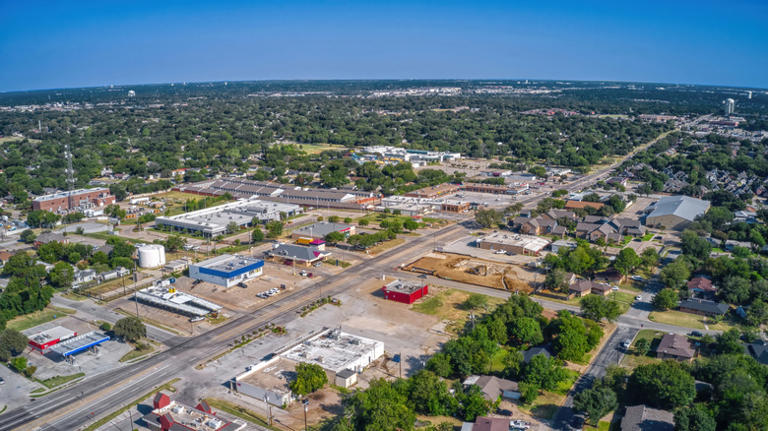 Sandwiched between Dallas and Fort Worth is a charming city with scenic ...
