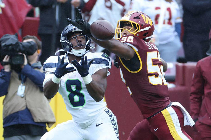 Washington Commanders linebacker Sonny Styles deflects a pass intended for Seattle Seahawks running back Jadarian Price. | IMAGN IMAGES via Reuters Connect