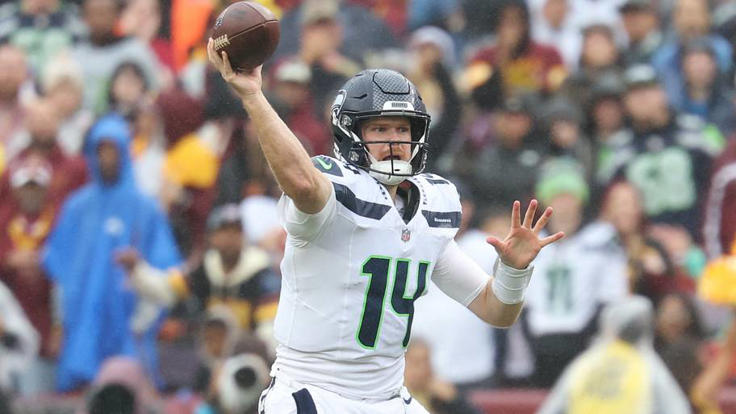 Seattle Seahawks QB Sam Darnold makes a throw against the Washington Commanders in the first half at Northwest Stadium. | IMAGN IMAGES via Reuters Connect