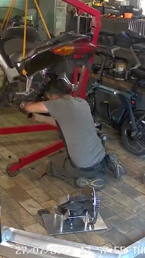 Wrench slip gone wrong: Mechanic's painful workshop fail caught on camera