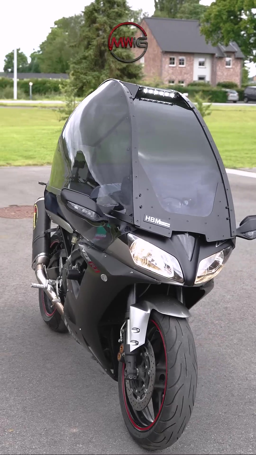 Inside the future: Test riding a fully enclosed canopy motorcycle!