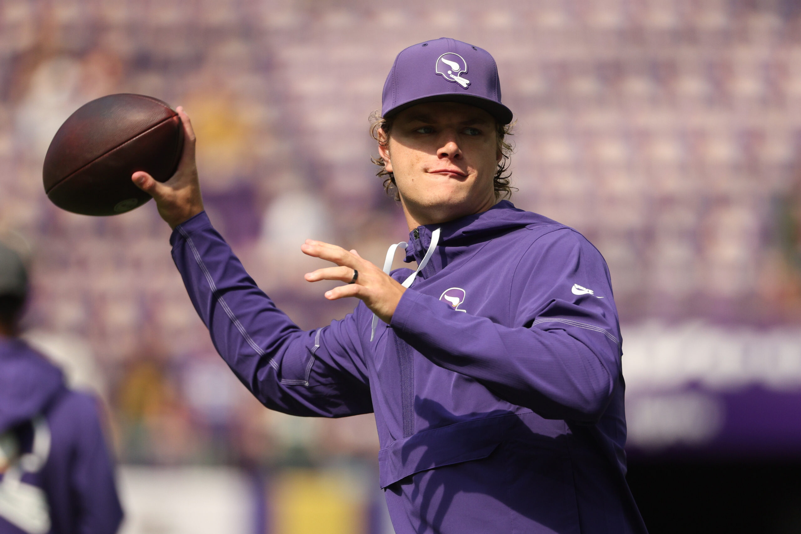Minnesota Vikings quarterback J.J. McCarthy (9)warms up before the game against the Green Bay Packers at U.S. Bank Stadium. Mandatory Credit: Matt Krohn-Imagn Images
