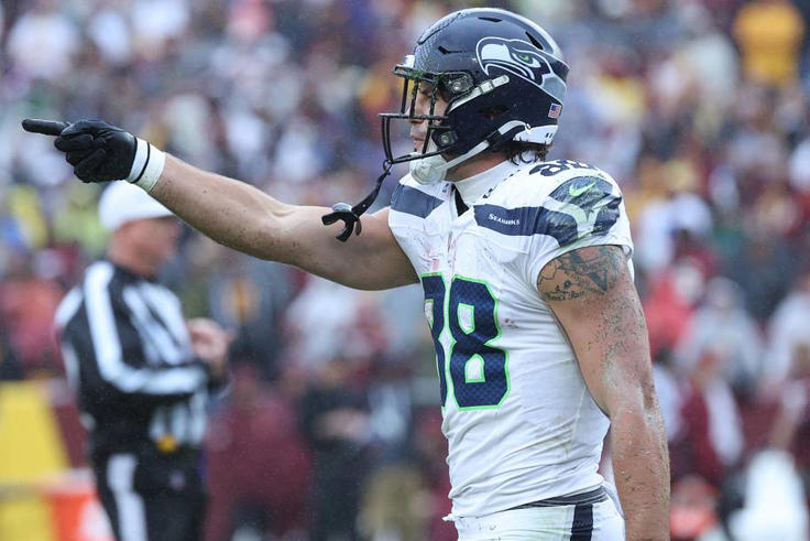 Seattle Seahawks tight end AJ Barner reacts after a catch against the Washington Commanders. | IMAGN IMAGES via Reuters Connect