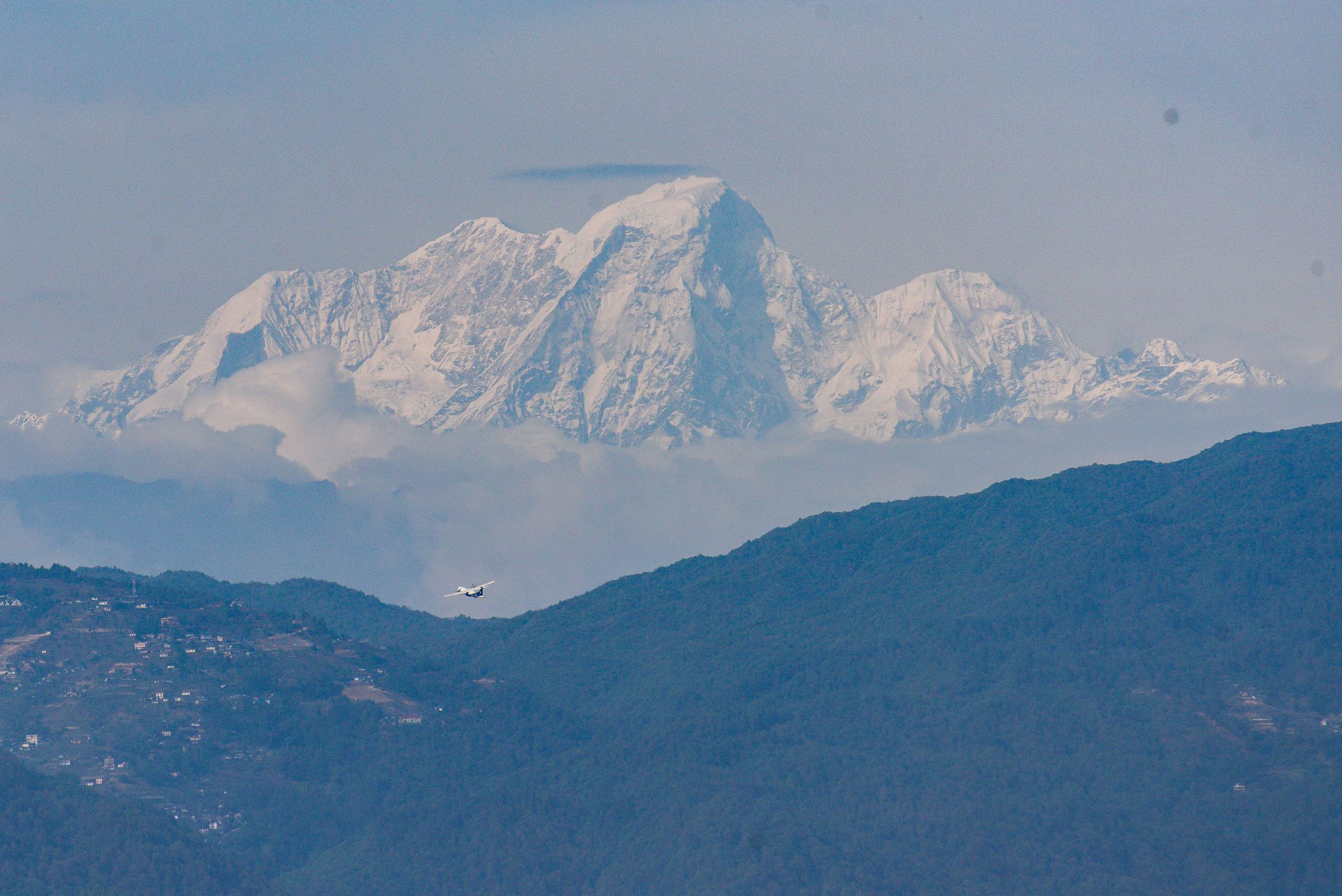 Two dead and 14 missing after avalanche hits popular peak in Himalayas