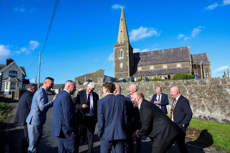 Protesters block Orange Order from marching through Catholic area in ...