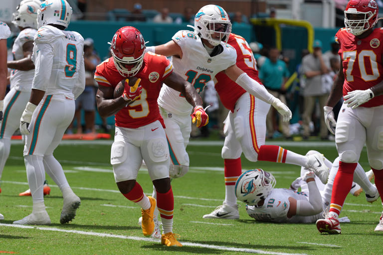 Kansas City Chiefs running back Kenneth Walker III scores a touchdown during an NFL football game against the Miami Dolphins, Sunday, Sept. 27, 2026, in Miami Gardens. (AP Photo/Lynne Sladky)