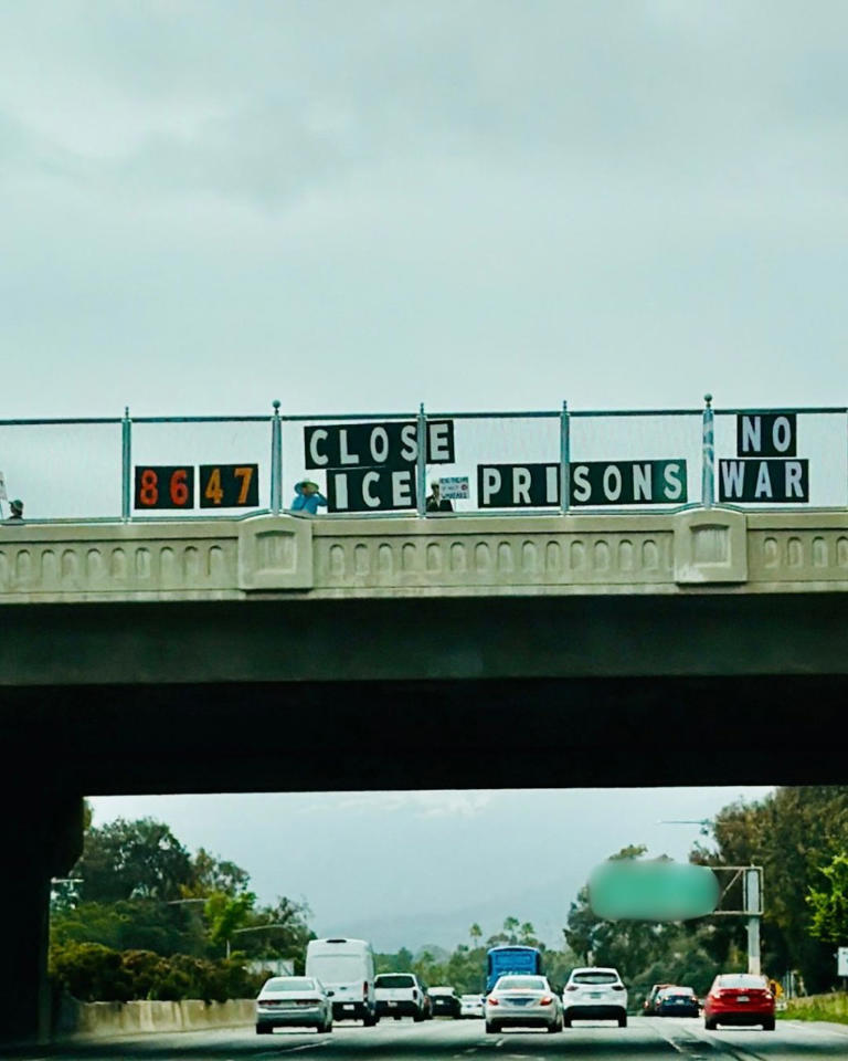 Twisted '8647' sign hung over Highway 101 near Santa Barbara