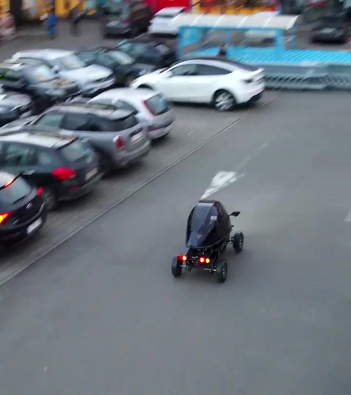 Futuristic microcar goes everywhere — elevator, mall & beyond!