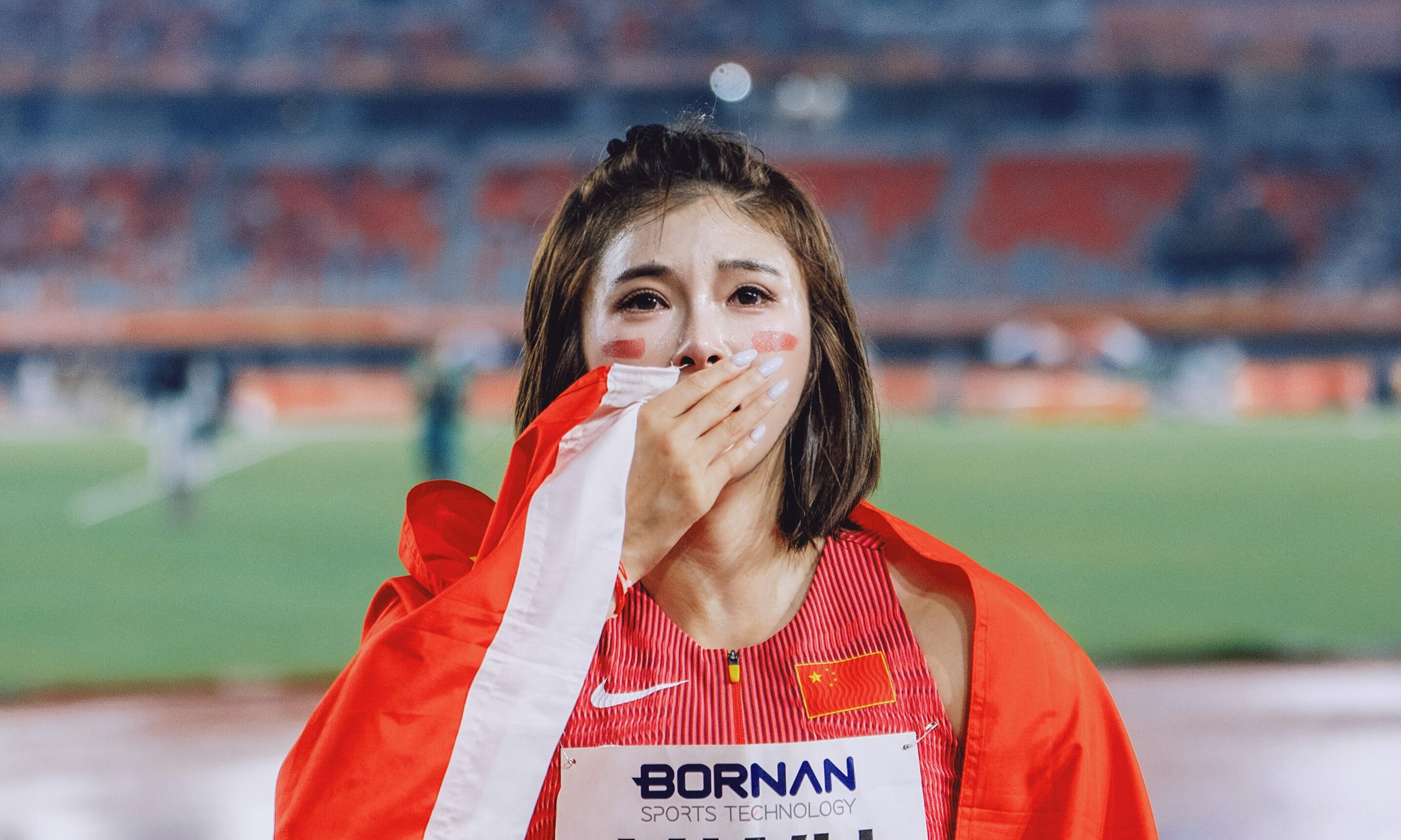 Chinese track and field star Wu Yanni moved to tears after winning ...