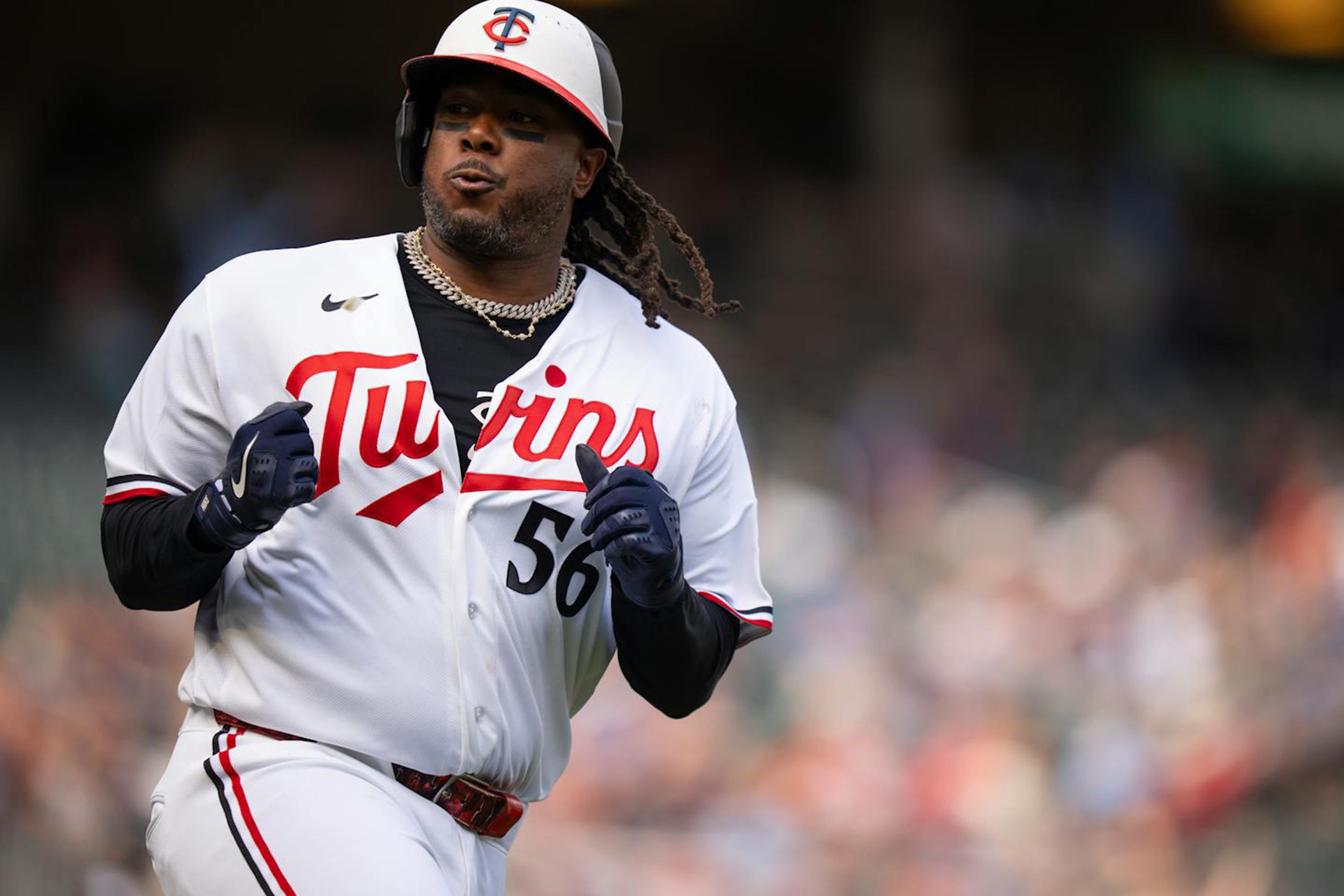 Twins eliminate Rangers from playoff race with 6-4 win in season finale