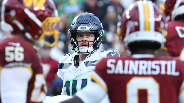 Sep 27, 2026; Landover, Maryland, USA; Seattle Seahawks quarterback Sam Darnold (14) in the second half at Northwest Stadium. | IMAGN IMAGES via Reuters Connect