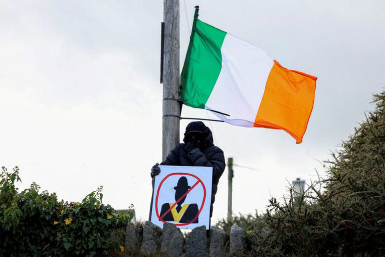 Protesters block Orange Order from marching through Catholic area in ...