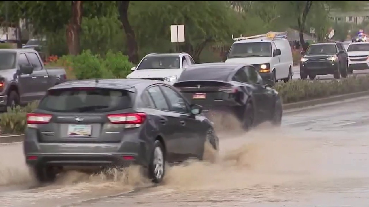 Officials warn of the dangers of driving into flooded roads
