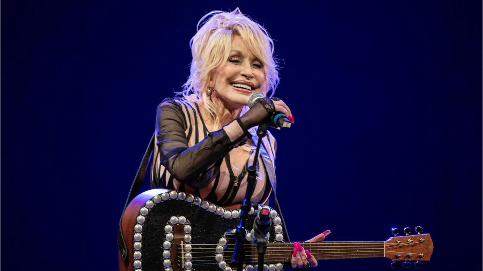 Dolly Parton posthumously duets with Bono on new U2 album