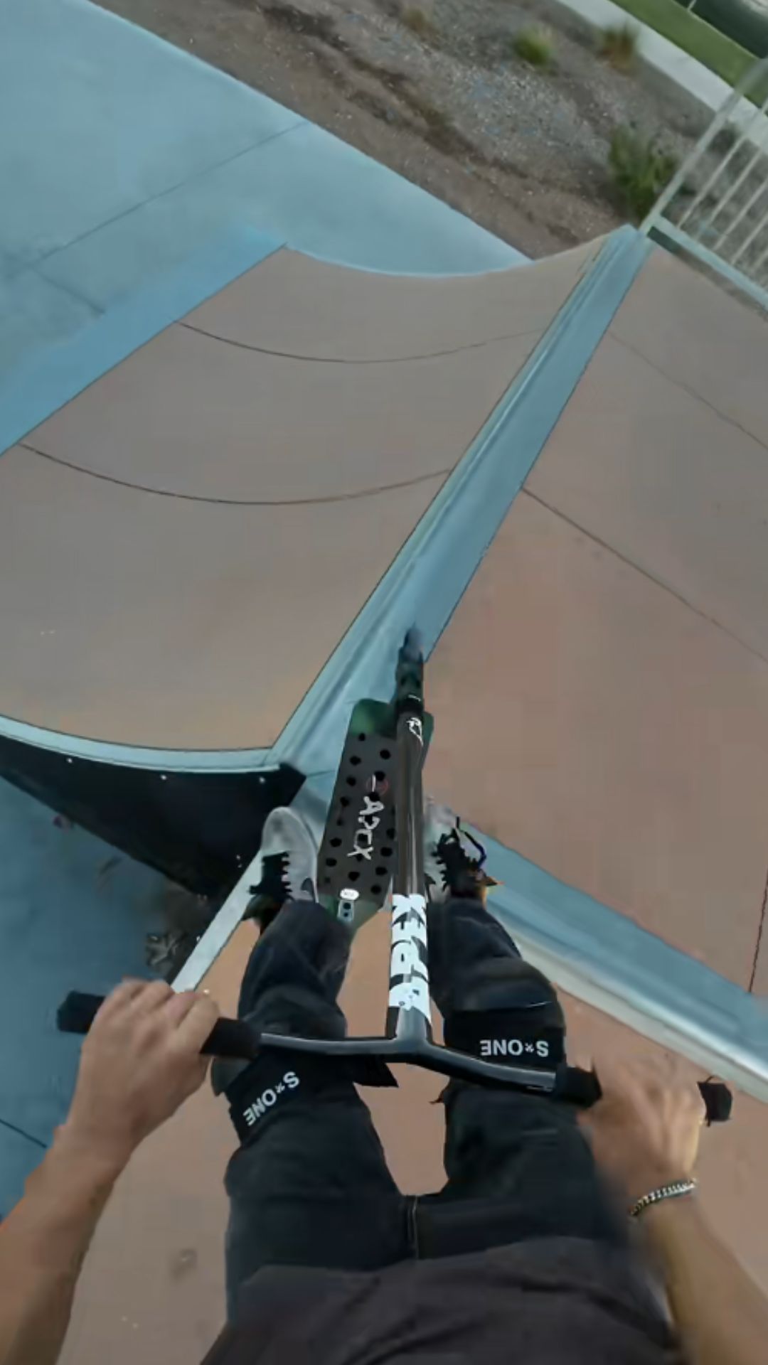 What does a scooter run on a mini ramp look like?