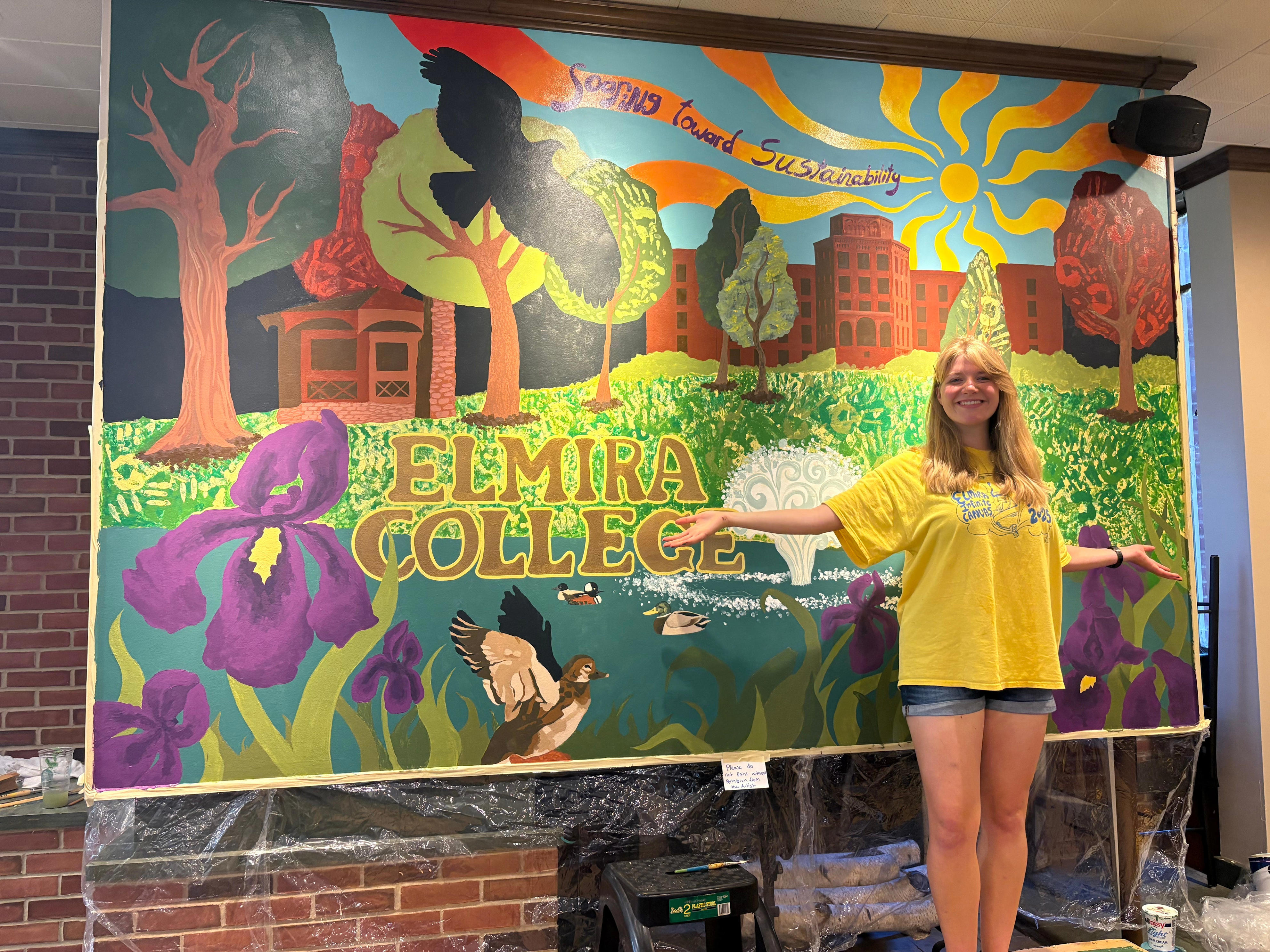 Student-led mural brings sustainability message to Elmira campus