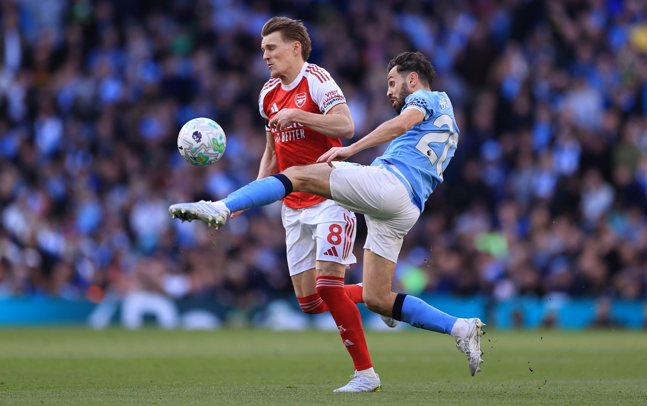 Odegaard and Bernardo Silva went head to head for the title in 2025-26 as captains of Arsenal and Manchester City - Offside via Getty Images/Simon Stacpoole