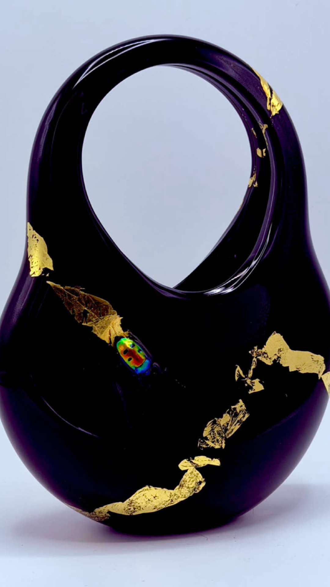 Transforming hot glass into a unique beetle sculpture
