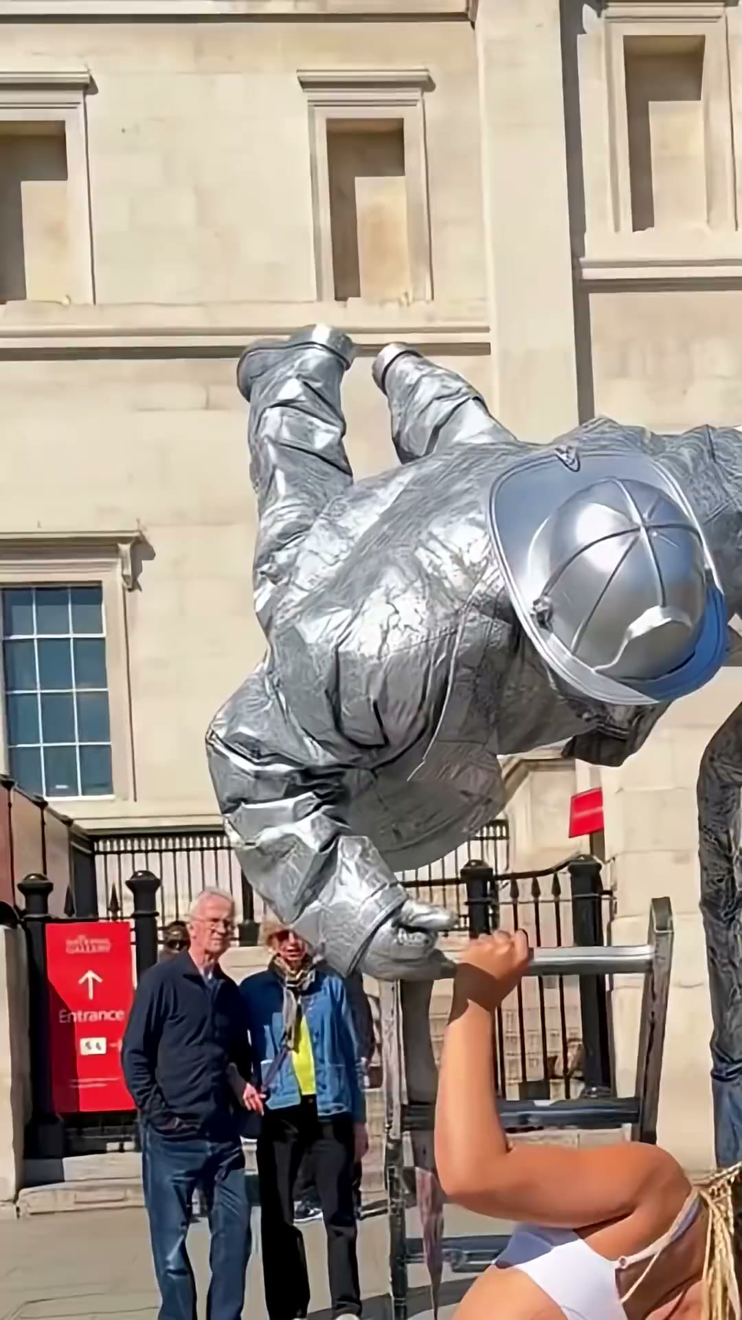 Silverman adds a playful twist to an acrobat backbend