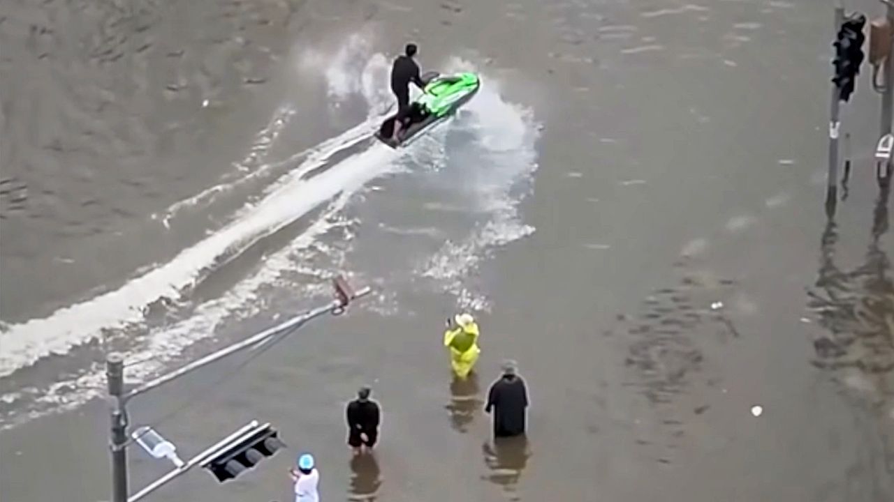 Man arrested after riding jet ski through flooded Bangkok street