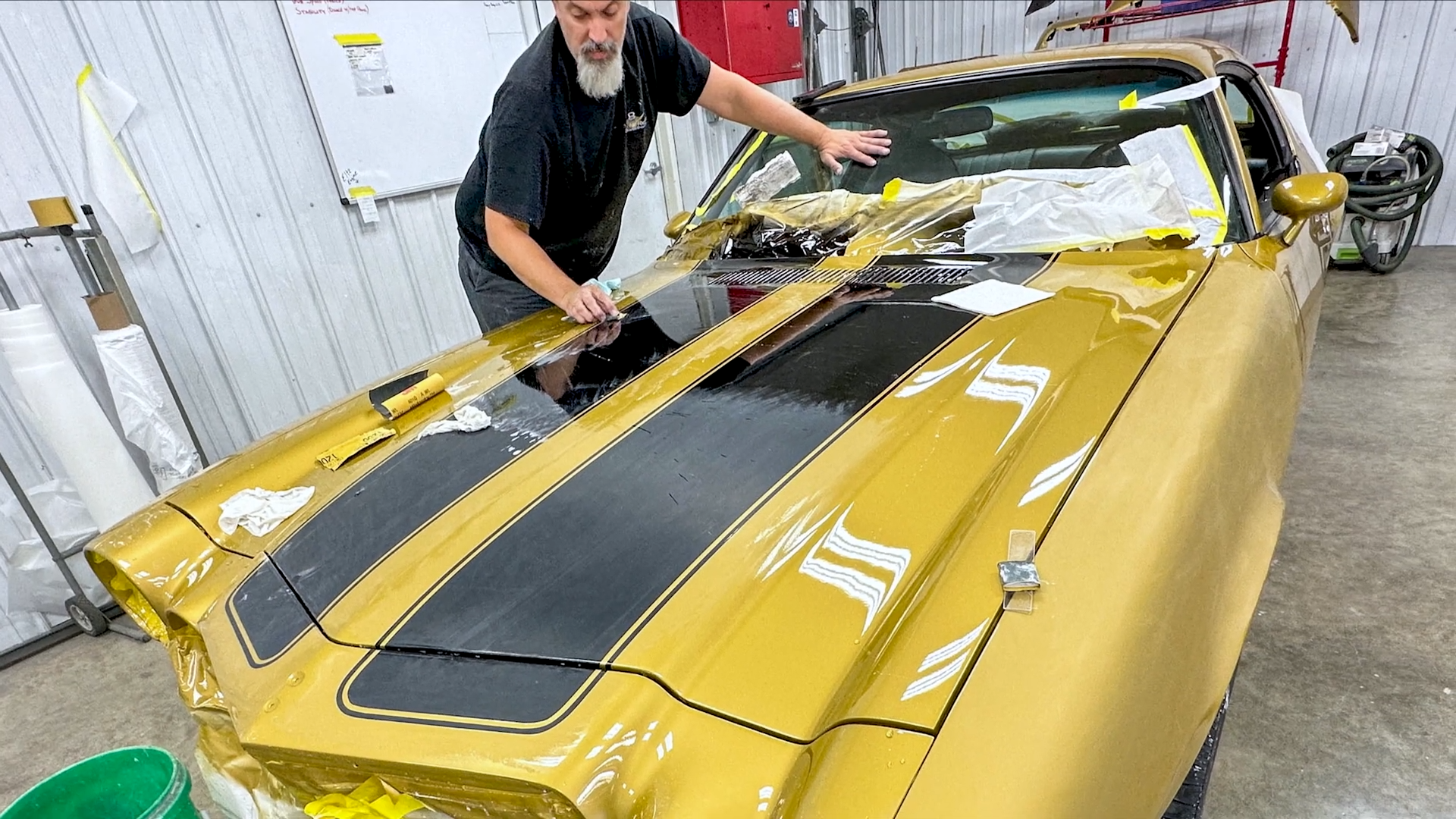 Transforming a classic Chevrolet Camaro with stripes and EFI