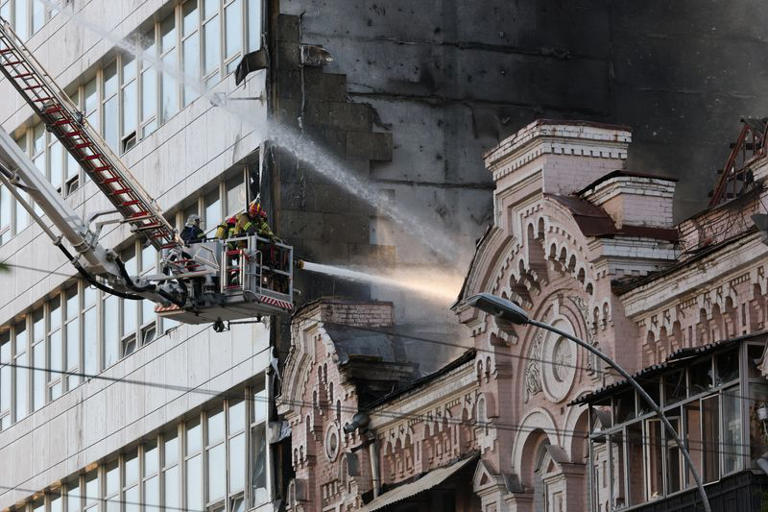 Firefighters work at the site of a Russian jet-powered drone strike, amid Russia's attack on Ukraine, in Kyiv, Ukraine, September 28, 2026. REUTERS/Alina Smutko