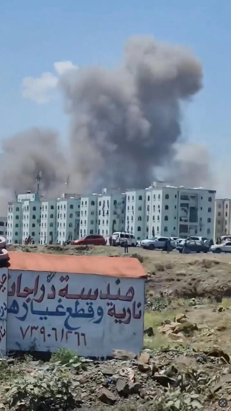 Smoke rises near buildings in Taiz Governorate, Yemen, following what the Houthi-run health ministry says was a strike on shops at a market, while Yemen's internationally recognised government says its forces targeted a Houthi military camp and vehicles at the same junction, September 27, 2026. (credit: Social Media/via REUTERS)