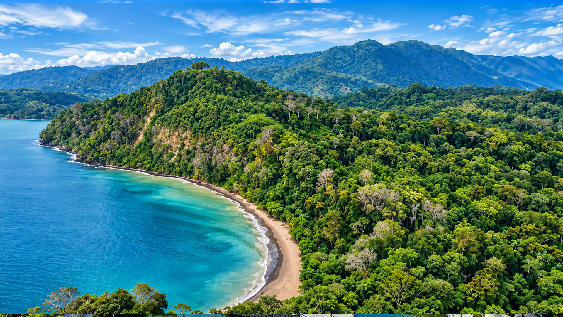 Costa Rican beach surrounded by tropical hills