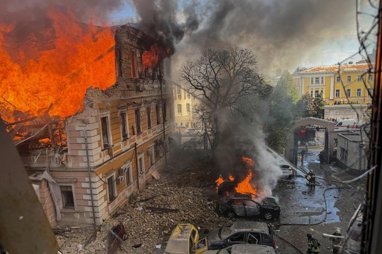 Firefighters attempt to extinguish fire at the site of the Ukraine's Academy of Sciences building hit by a Russian jet-powered drone strike, amid Russia's attack on Ukraine, in Kyiv, Ukraine, September 28, 2026. REUTERS/Sergiy Chalyi