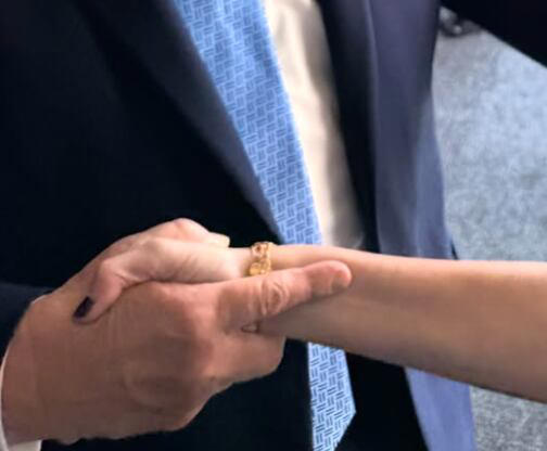 Trump’s awkward hand grip with GOP chair’s wife raises eyebrows