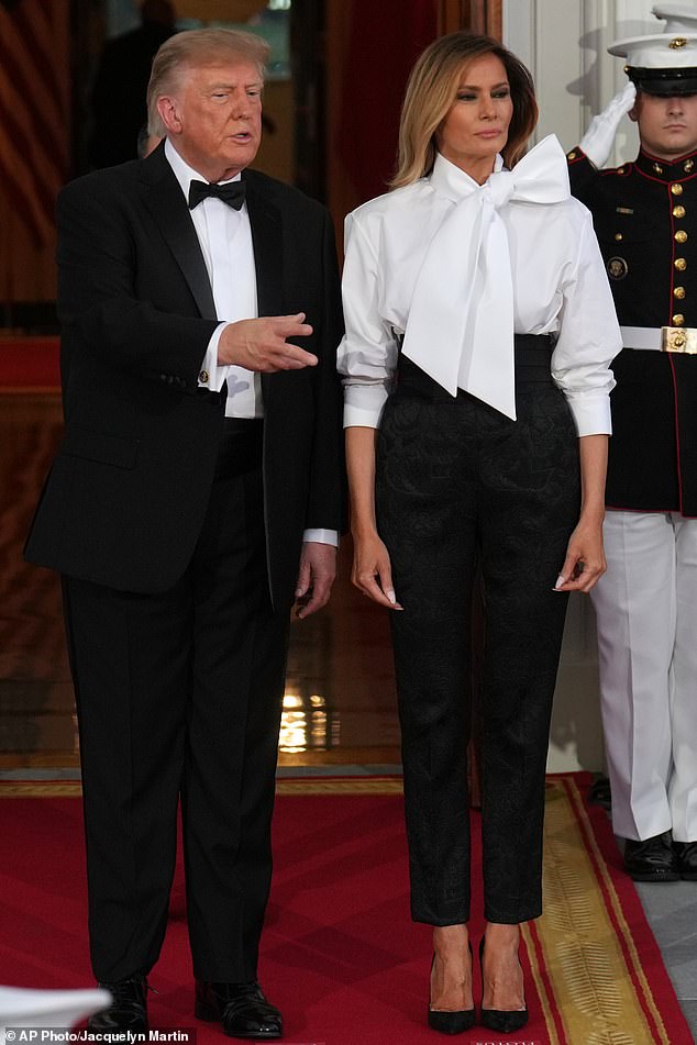 Xi Jinping's wife Peng Liyuan commands attention in fiery red gown at ...