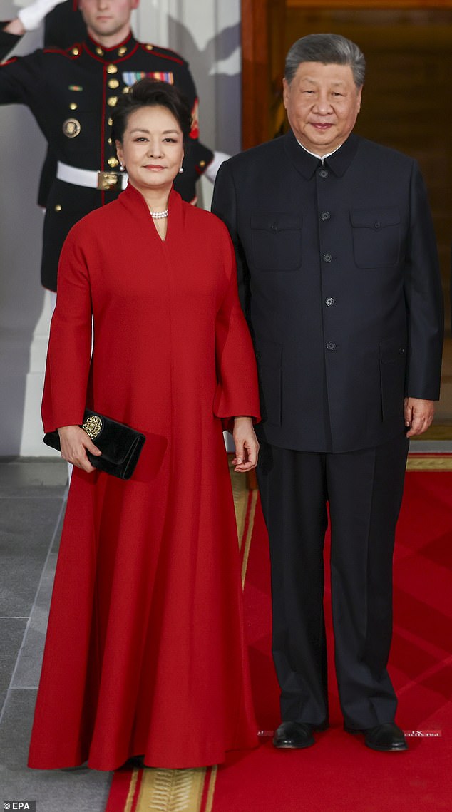 Xi Jinping's wife Peng Liyuan commands attention in fiery red gown at ...