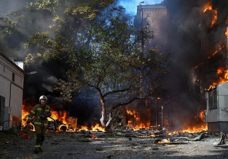 A firefighter works at the site of a building of a private medical centre hit by a Russian drone strike, amid Russia's attack on Ukraine, in Kyiv, Ukraine, September 28, 2026. REUTERS/Viacheslav Ratynskyi