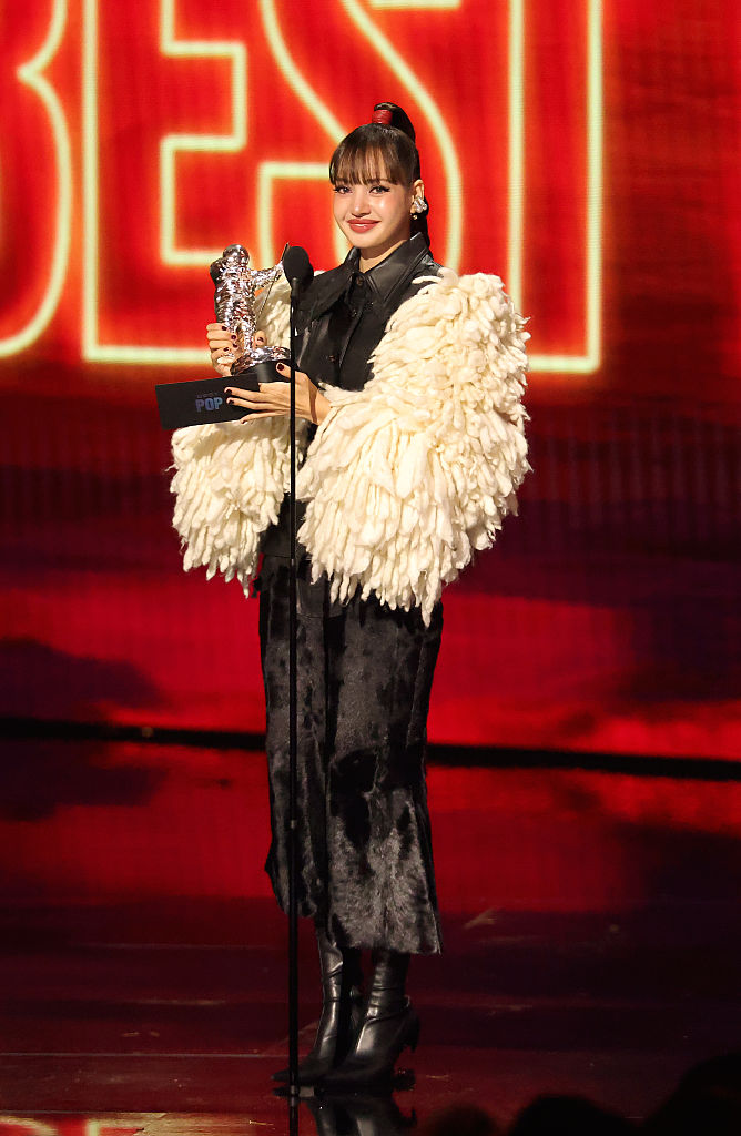 Lisa wears The Attico and Quine Li in all red at the 2026 VMAs