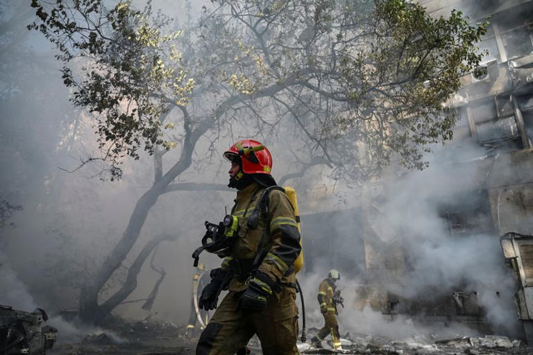 Firefighters work at the site of a building of a private medical centre hit by a Russian drone strike, amid Russia's attack on Ukraine, in Kyiv, Ukraine, September 28, 2026. REUTERS/Viacheslav Ratynskyi