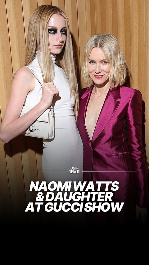 Naomi Watts goes braless in fuchsia suit at Gucci store show