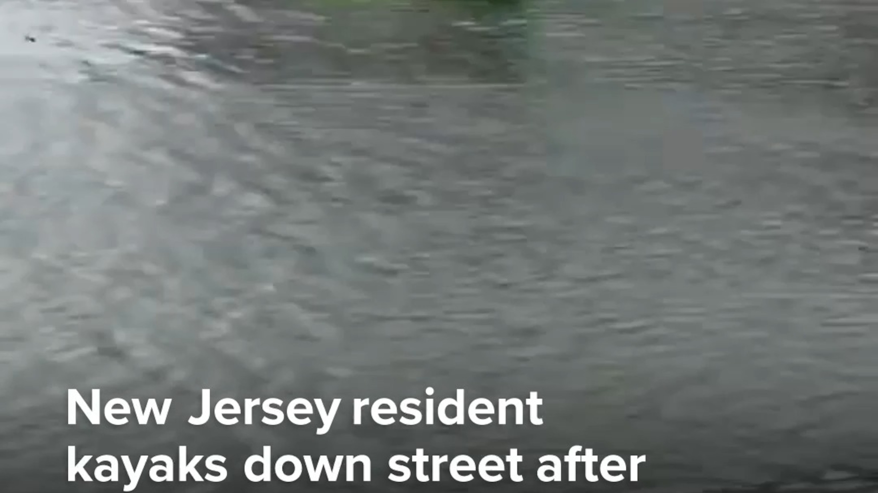 New Jersey resident kayaks down street after nor'easter floods the area