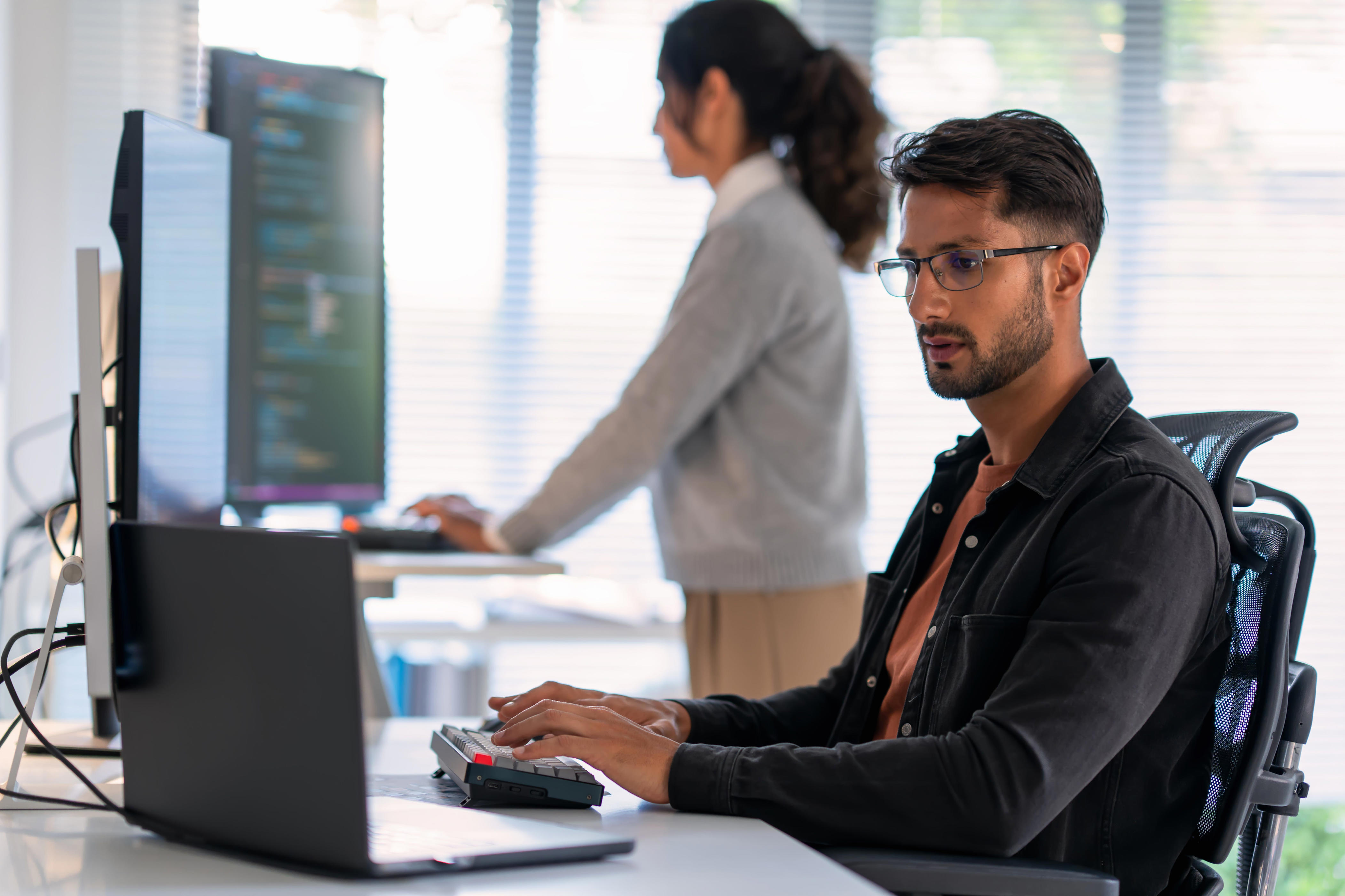 PwC's huge survey of 50,000 workers says AI is splitting employees into ...