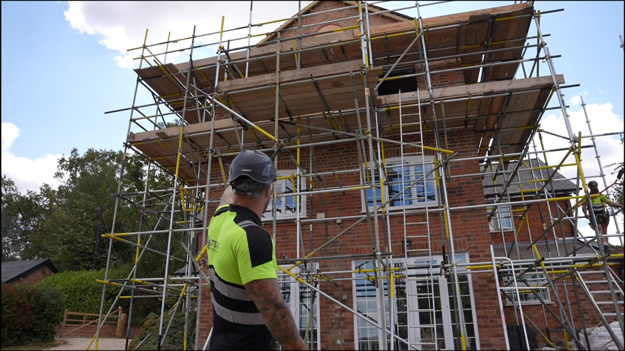 Heavy Scaffolding Crew Rushing The Clock For An Emergency Building
