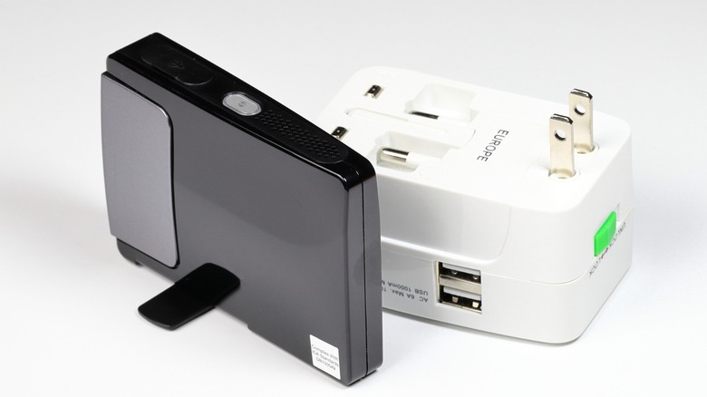 What is a travel router and how does it work?