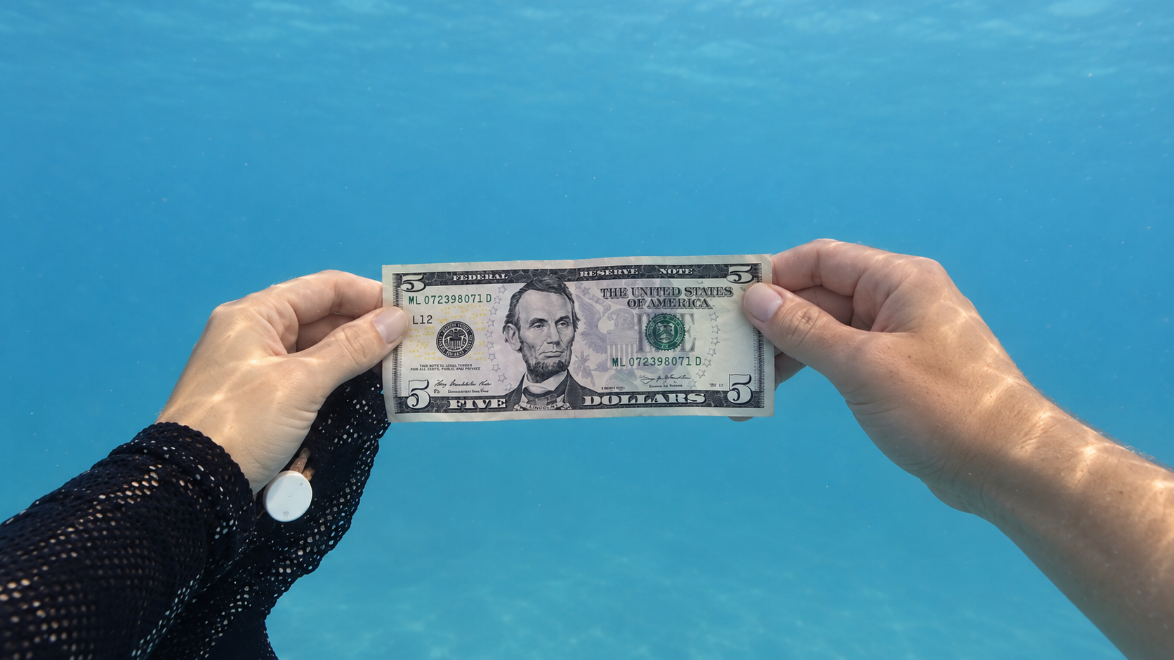 He reached into a pile of trash - then he found cash
