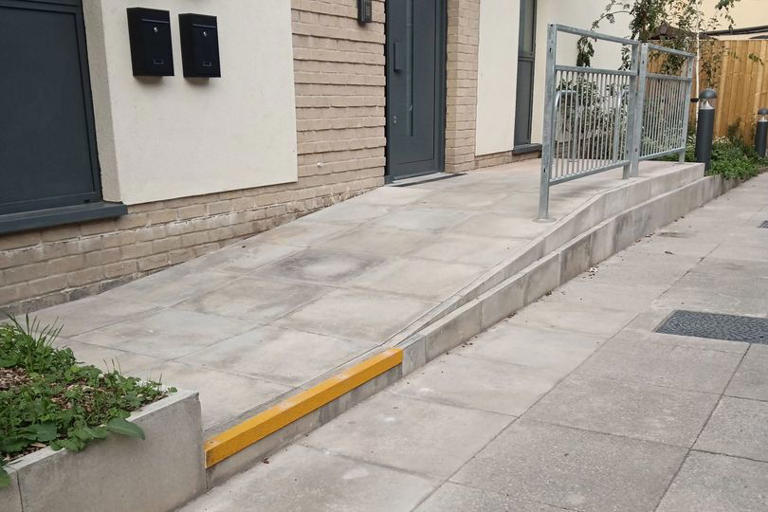 Accessible wheelchair ramp ends in a step at new Keynsham council houses