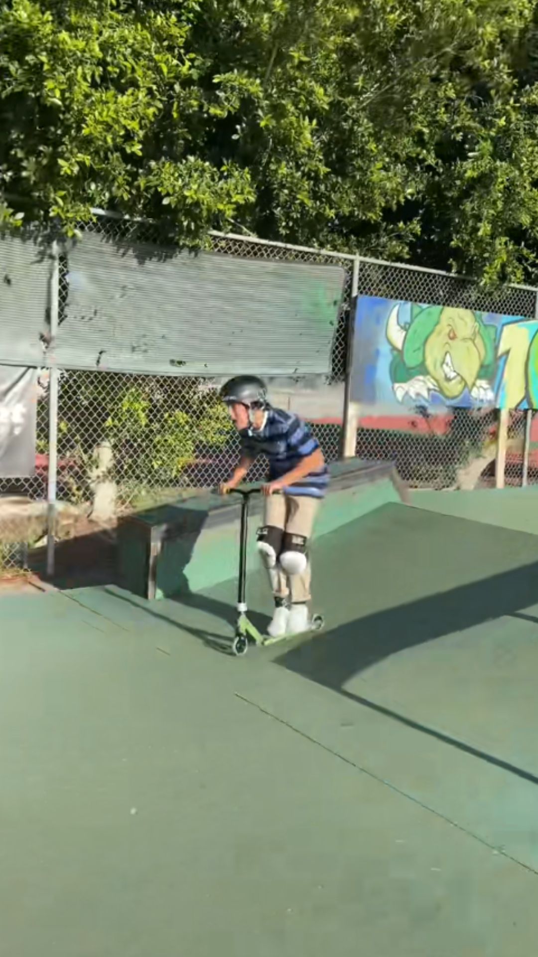Scooter rider shows impressive balance with a technical trick