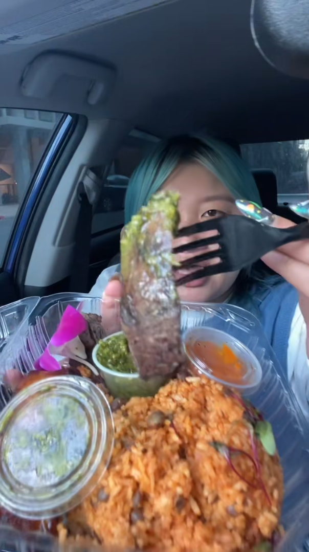 Eating Puerto Rican food, mofongo, steak and alcapurrias