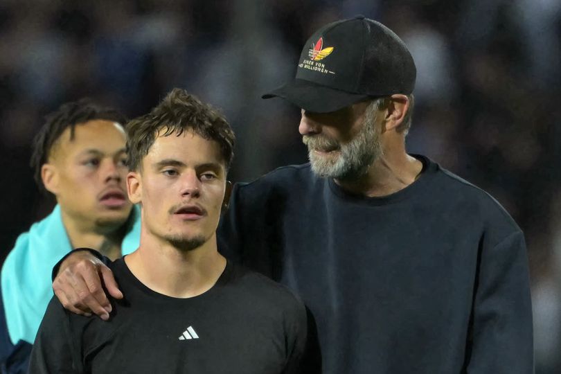 Germany's head coach Jurgen Klopp comforts Liverpool attacking midfielder Florian Wirtz at the end of the UEFA Nations League match in Greece on October 4 2026