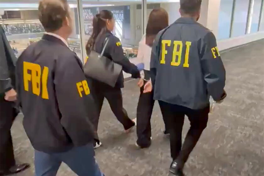 Feds say OC woman secretly worked for China, surveilled son of Taiwan's president