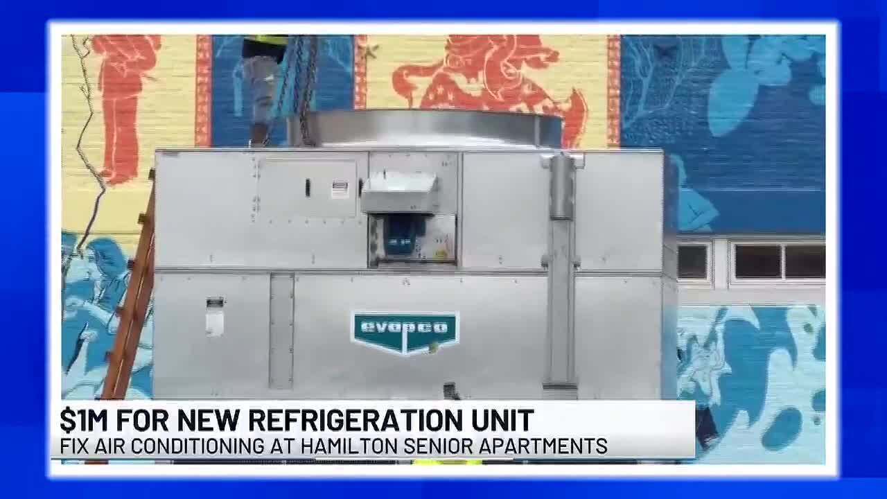 Crews install new cooling unit at Hamilton Apartments